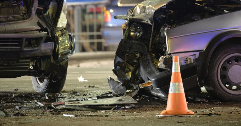 Photo of head on car collision