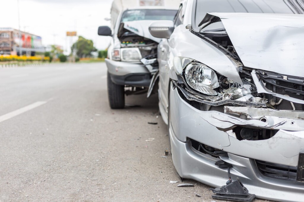 Photo of car accident involving two silver colored cars
